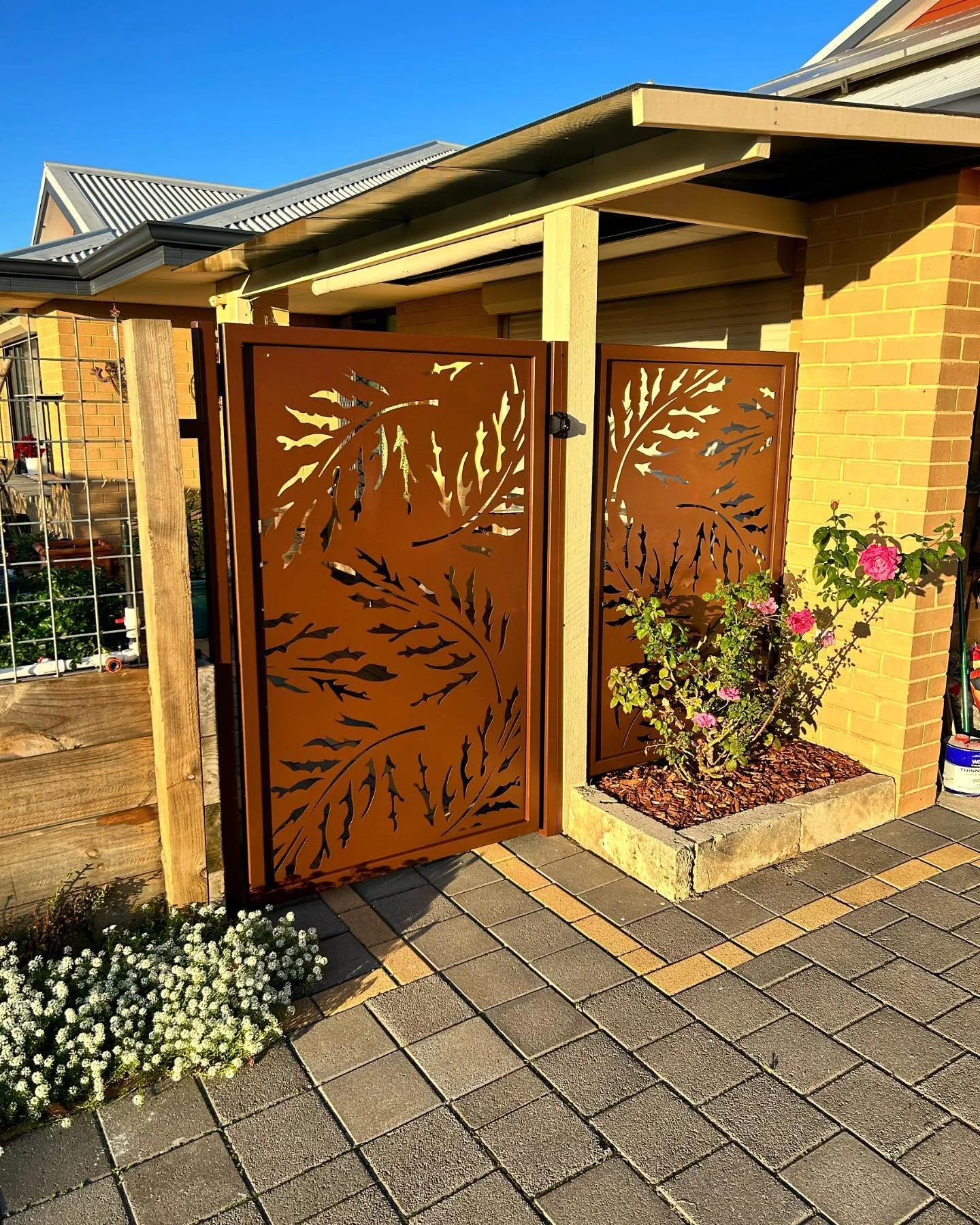 Decorative rust-coloured metal gates