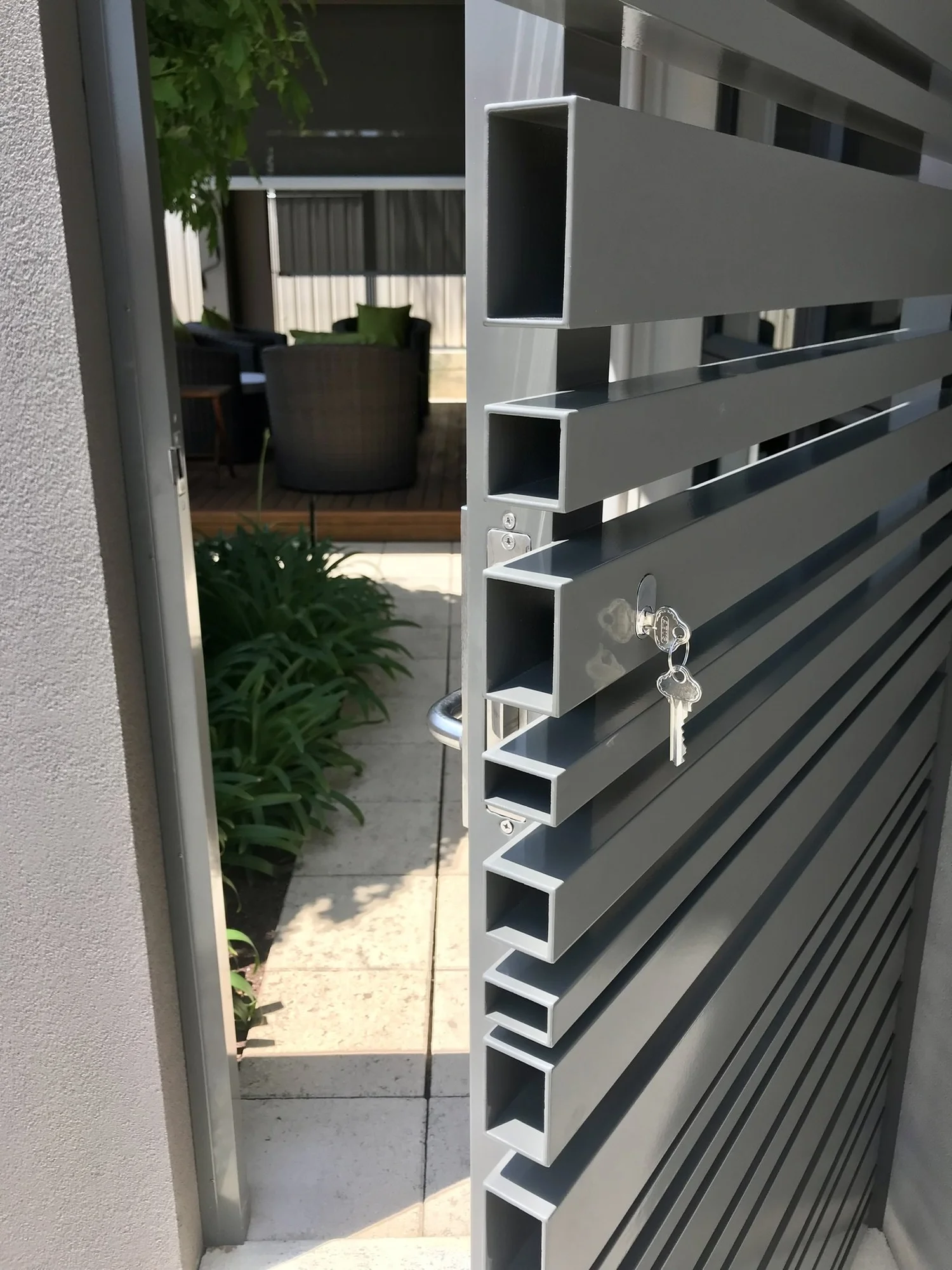 Detailed aluminium gate with keypad latch